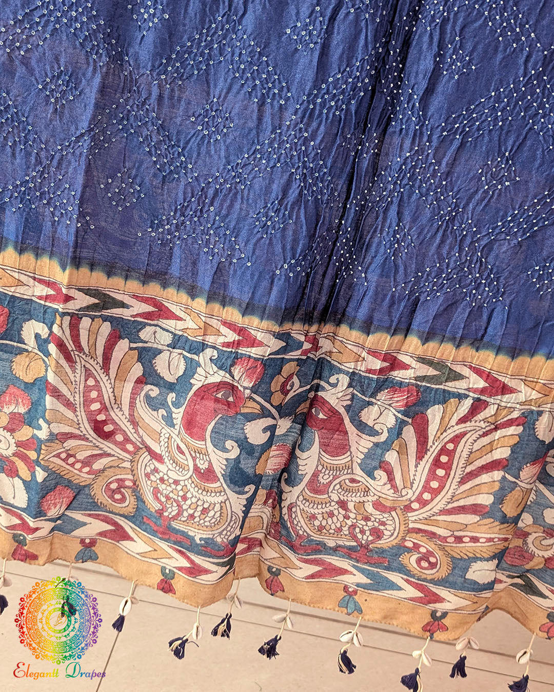 Close-up of the hand-painted Kalamkari floral border on the Navy Blue Muga Silk Dupatta