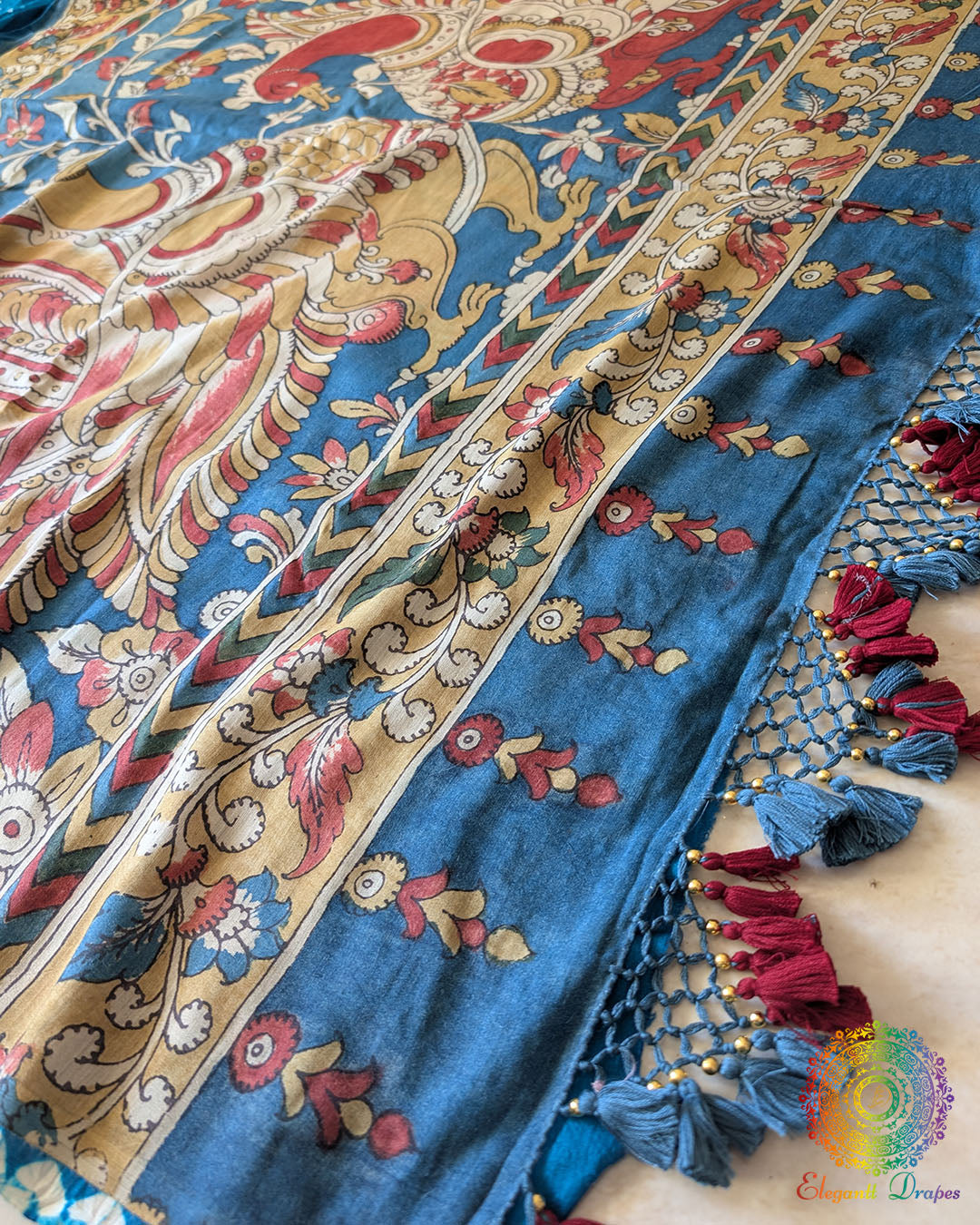Close-up showcasing the elegant craftsmanship and traditional details of the Blue Bandhani Kalamkari Muga Silk Saree