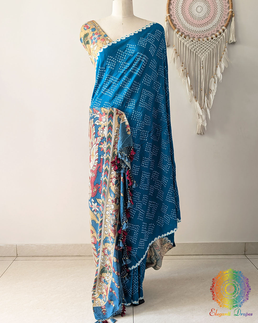Full drape of the Blue Bandhani Kalamkari Muga Silk Saree displayed on a mannequin with intricate Bandhani and Kalamkari detailing