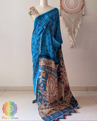 Blue Bandhani Kalamkari Muga Silk Saree showcased on a mannequin highlighting its elegant drape and traditional craftsmanship