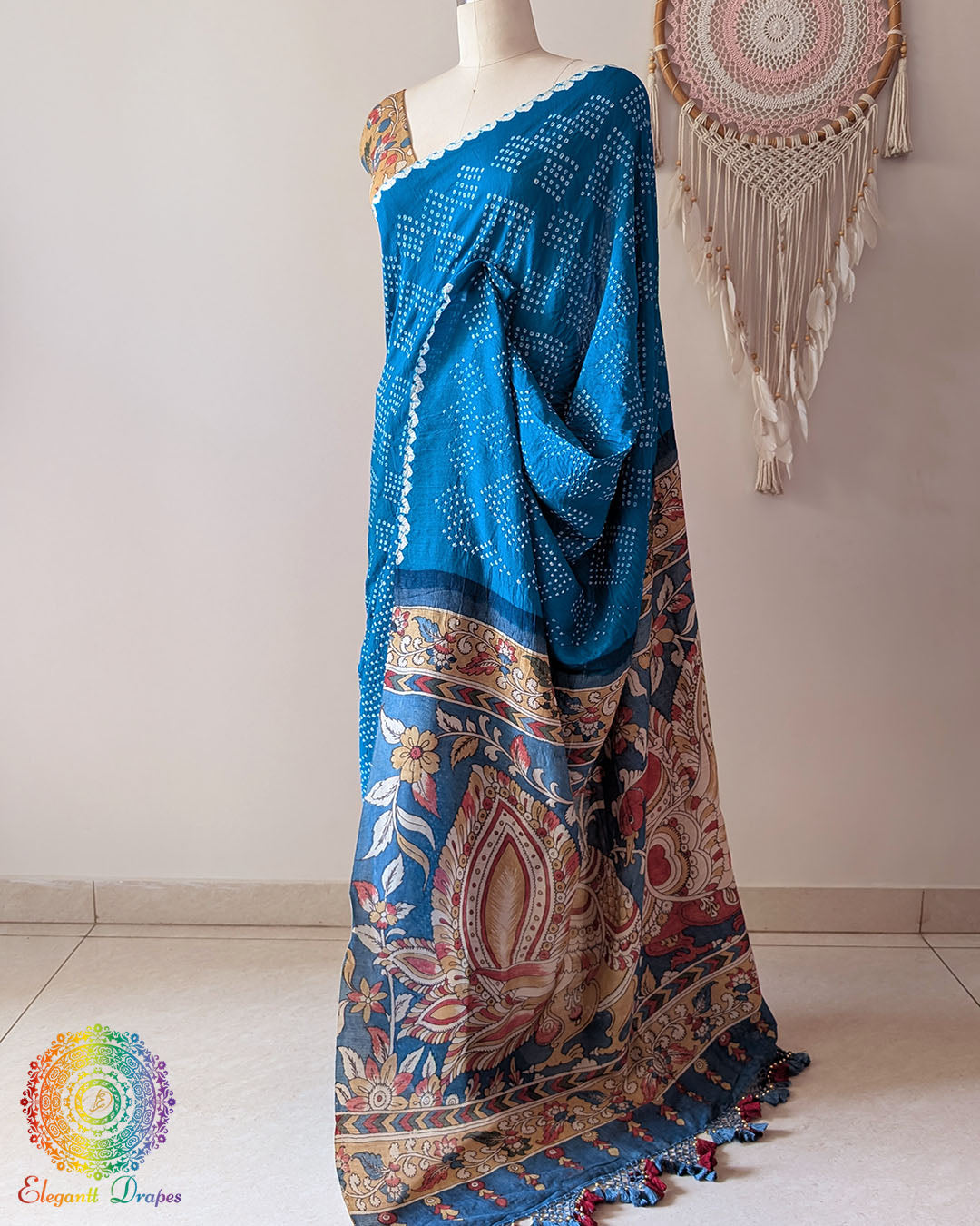 Side view of the Blue Bandhani Kalamkari Muga Silk Saree showcasing the graceful silhouette and rich fabric texture
