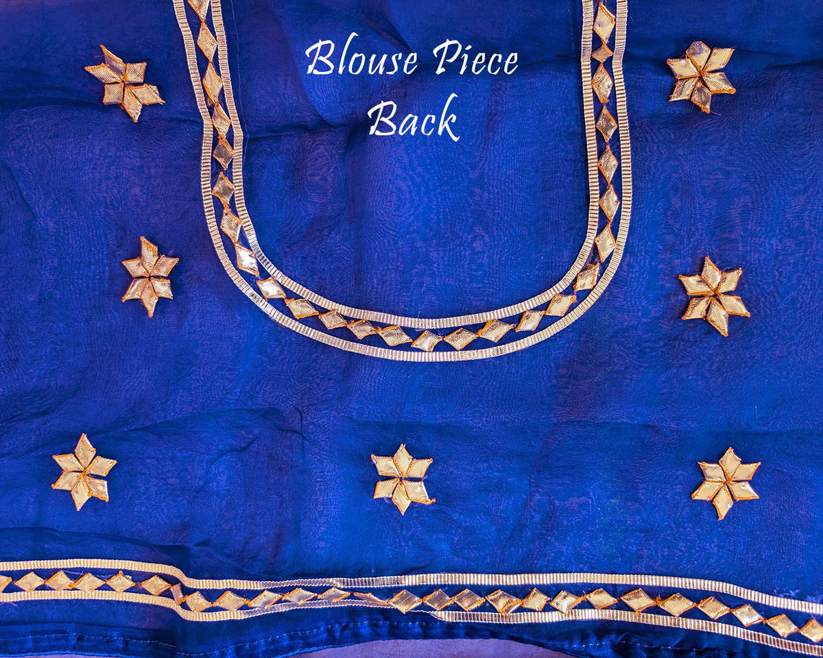 Royal Blue Organza Leheria Saree – Blouse back view featuring the coordinated Organza fabric and matching traditional Kachha Gota detailing