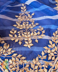 Royal Blue Organza Saree – Detailed Leheria pattern enhanced with carefully handcrafted Kachha Gota embellishment across the saree body