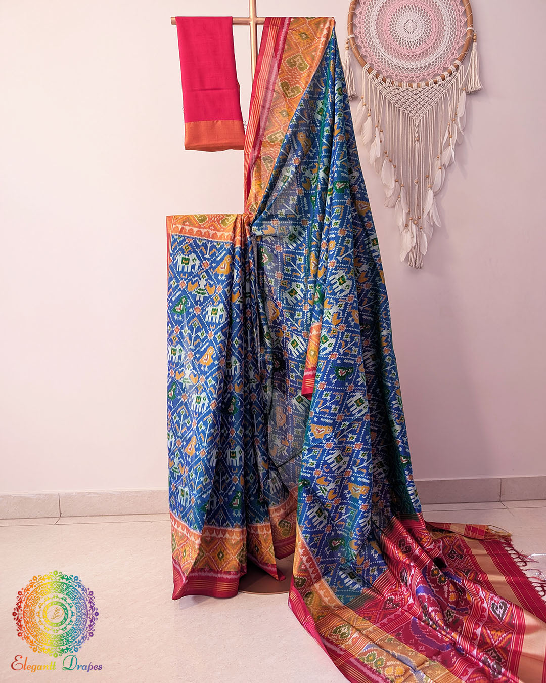 Blue pure mulberry silk rajkot patola saree with red border and palla Elegantt Drapes