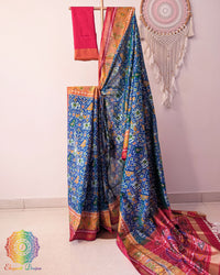 Blue pure mulberry silk rajkot patola saree with red border and palla Elegantt Drapes