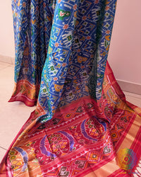 Blue rajkot patola silk saree palla view with red contrast