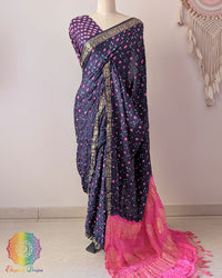 Navy blue pure gaji silk Bandhani saree on mannequin with baby pink palla and Nakshi woven border