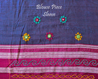 Matching blouse sleeve with handcrafted Lambani embroidery showcasing traditional artisan detailing