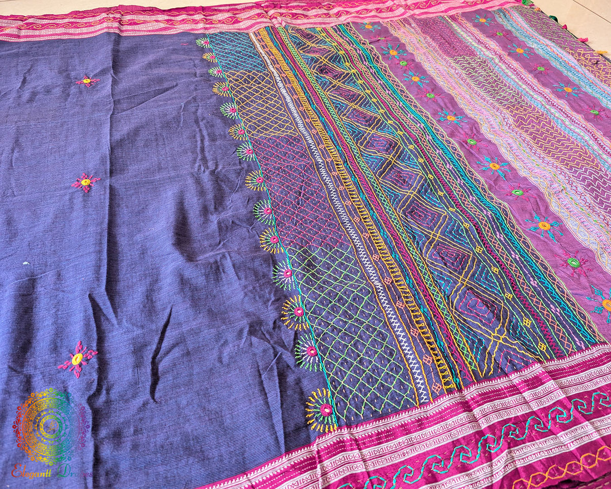 Blue Ilkal cotton fabric showcasing handcrafted Lambani embroidery and woven texture