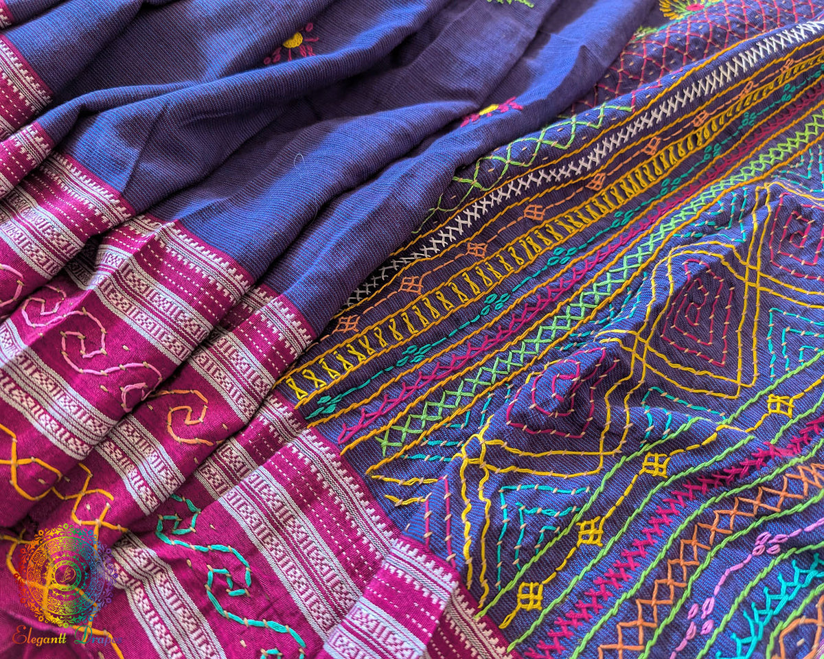 Side view of blue Ilkal cotton saree featuring all-over Lambani hand-embroidered bootas