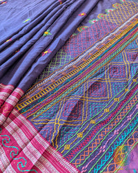 pleats of blue Ilkal cotton saree showcasing Lambani hand embroidery and elegant fall