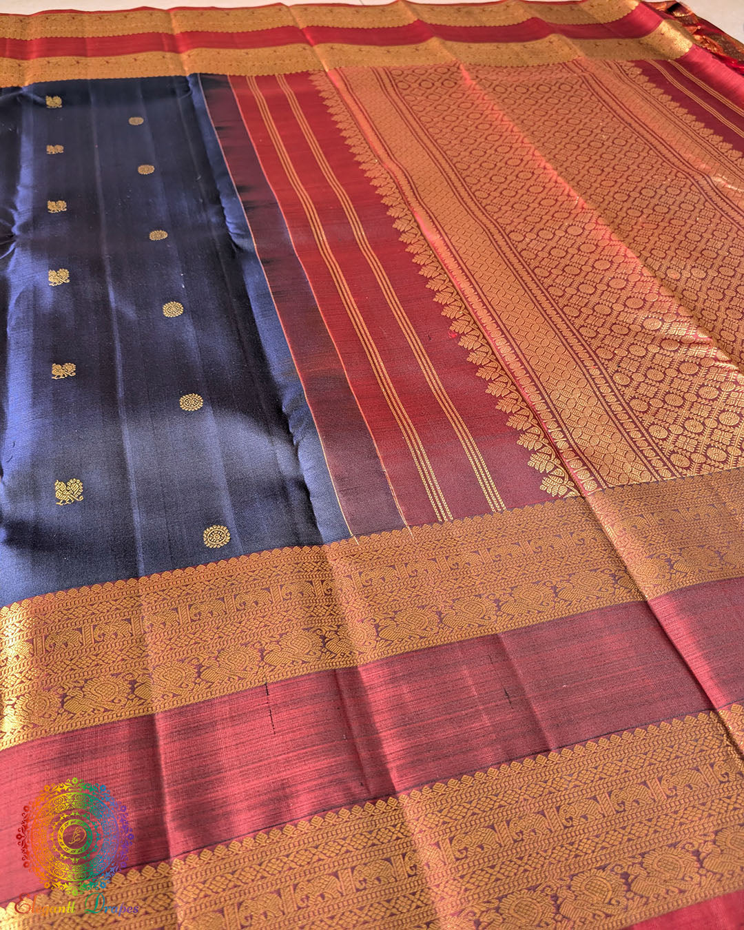 Navy blue Kanjivaram silk saree body close up highlighting rich 2 gram zari weaving