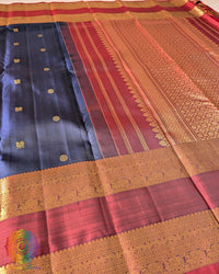 Navy blue Kanjivaram silk saree body close up highlighting rich 2 gram zari weaving