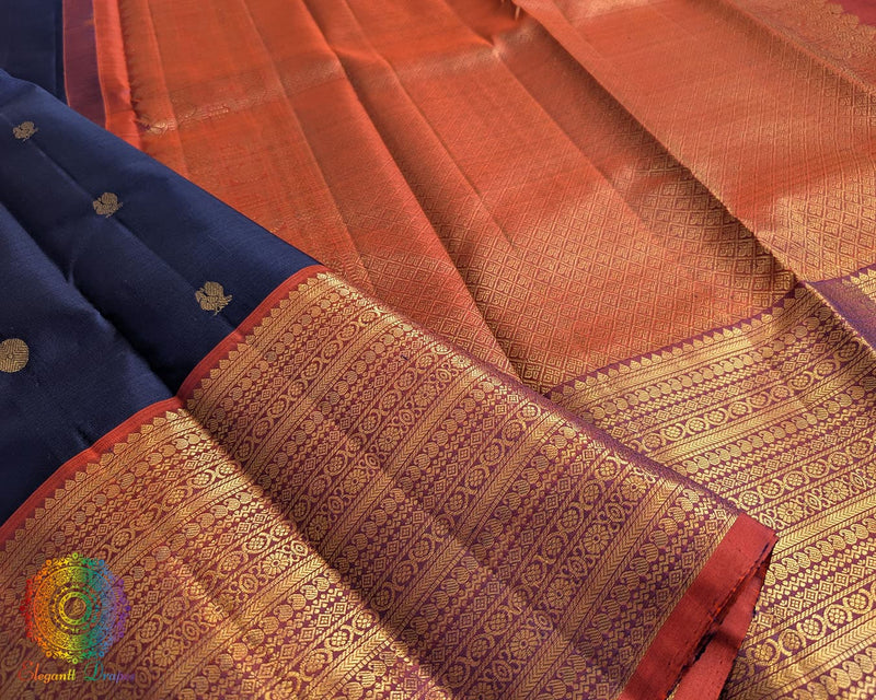 Blue rust handwoven Kanjivaram silk saree zari border detail