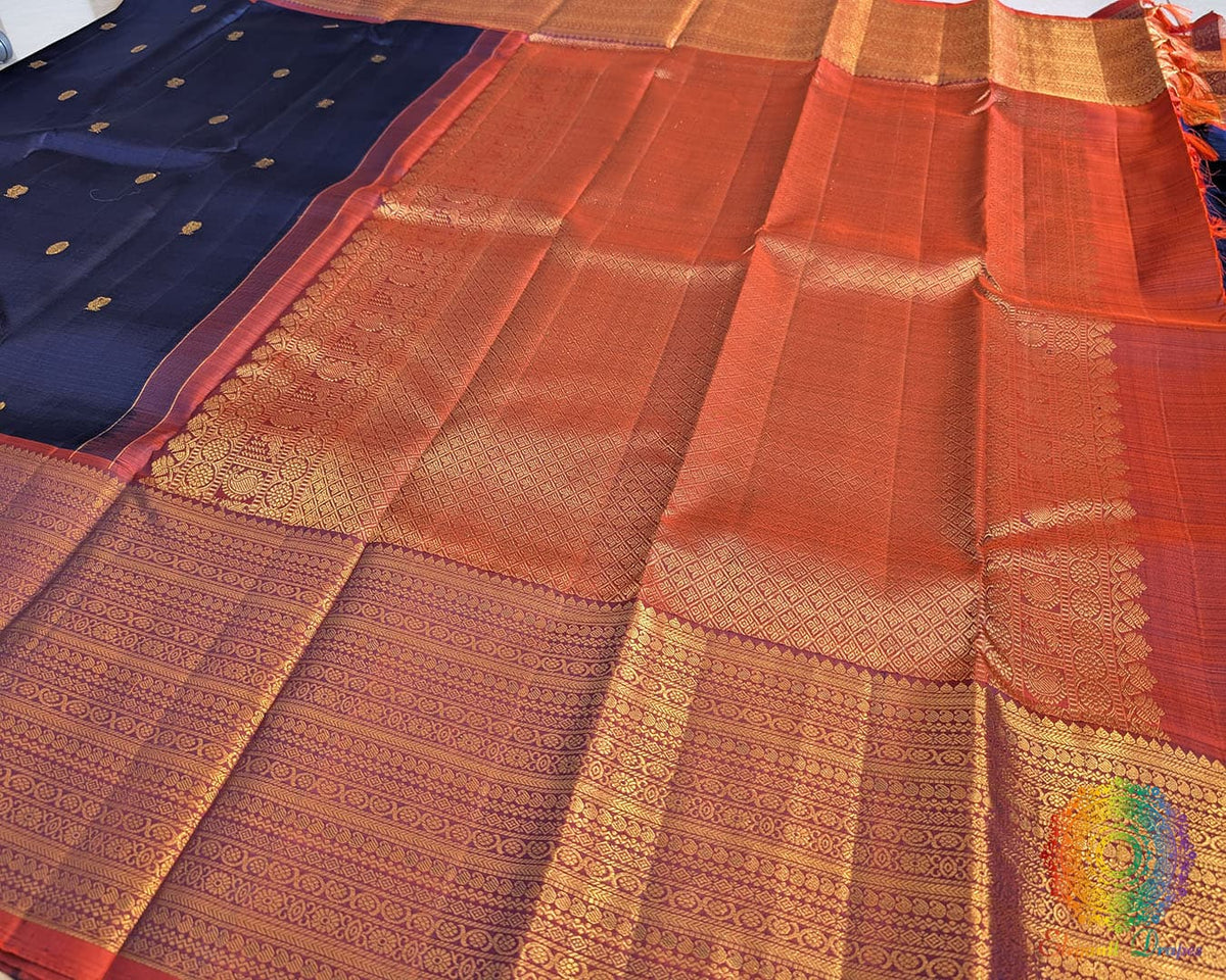 Blue rust Kanjivaram silk saree contrast pallu close up