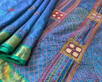 Close-up of Colourful Sindhur Lambani Motifs on Kanjivaram Silk Saree