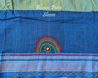 Matching blouse sleeve with handcrafted Lambani embroidery and traditional artisan detailing