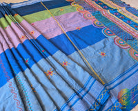 Steel blue Ilkal cotton saree highlighting striped body and handcrafted Lambani bootas