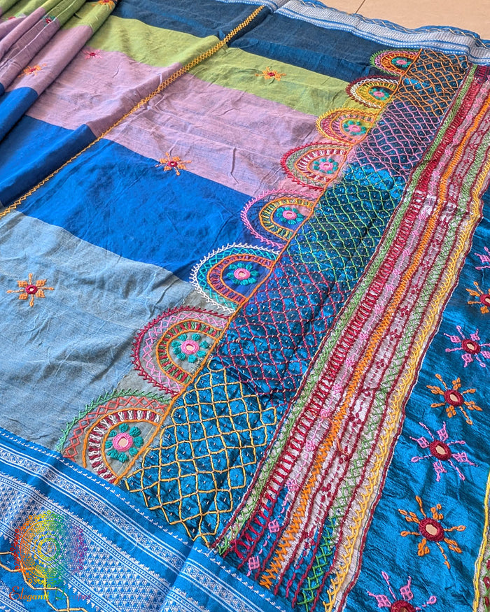 Steel blue Ilkal cotton saree with striped body, Lambani handwork, and heavily embroidered palla