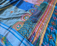 Side view of steel blue Ilkal cotton saree featuring traditional Lambani hand embroidery