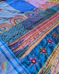 Palla of steel blue Ilkal cotton saree showcasing Lambani hand embroidery and striped woven design