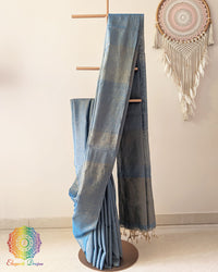 Blue Bengal linen tissue saree showing elegant drape and zari stripe palla