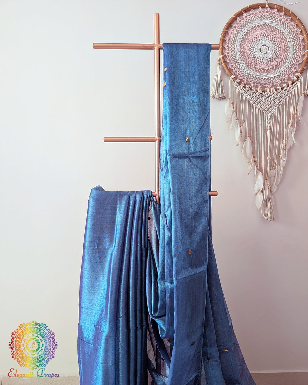 Close up of blue Bengal mul tissue saree with sequins work
