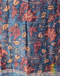 Close-up of authentic hand-painted Kalamkari artwork highlighting the rich texture and natural sheen of Blue Pure Tussar Silk dupatta