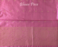 Matching blouse piece in blush pink Banarasi Katan silk fabric showing woven zari detailing