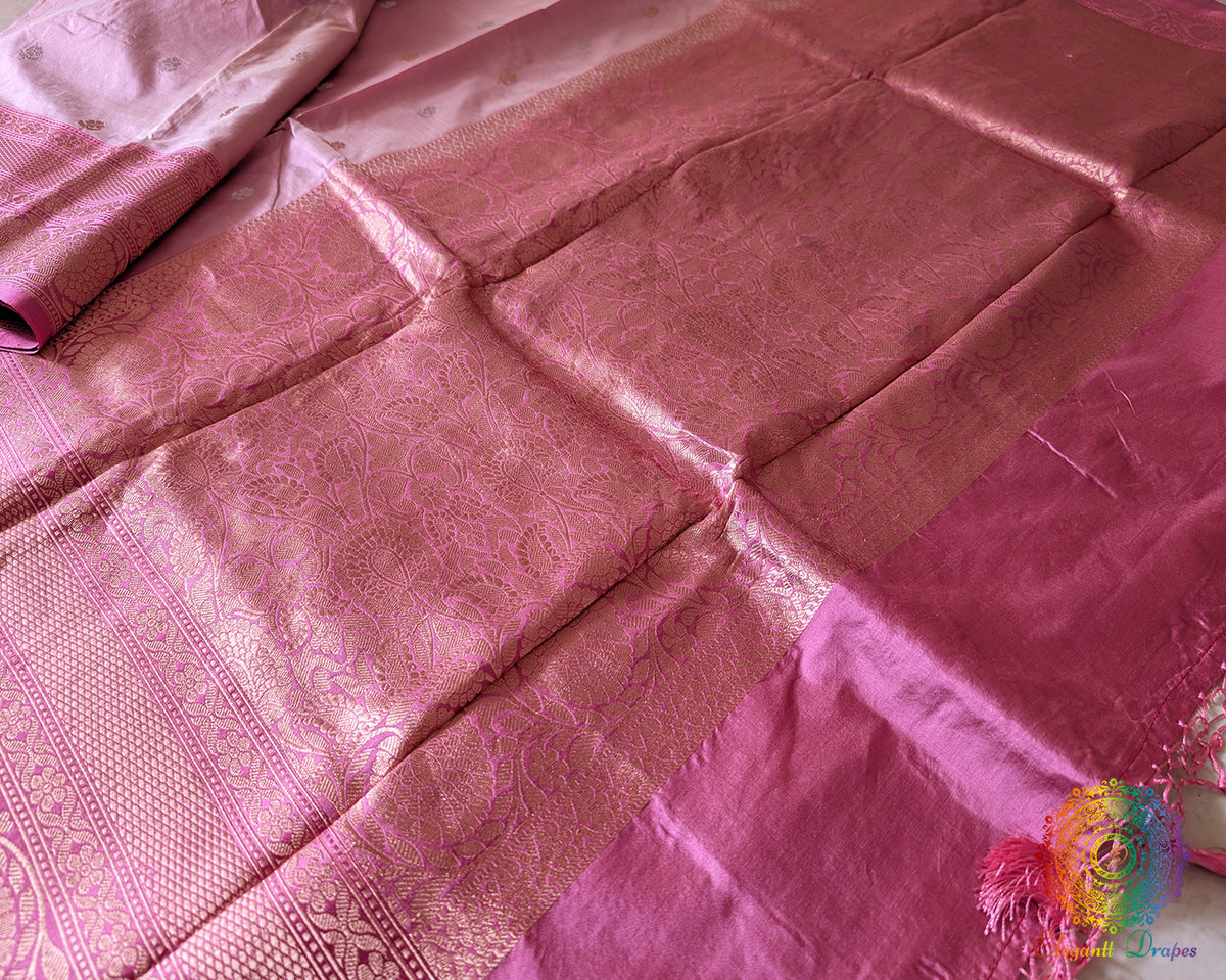 Palla close up on blush pink Banarasi handloom Katan silk saree showcasing zari weave