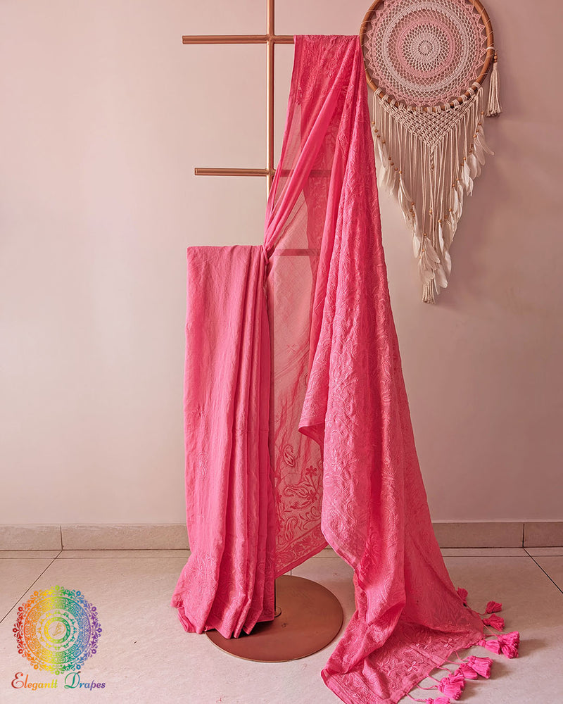 Blush pink Bengal cotton saree with Chikankari-inspired threadwork showing elegant drape