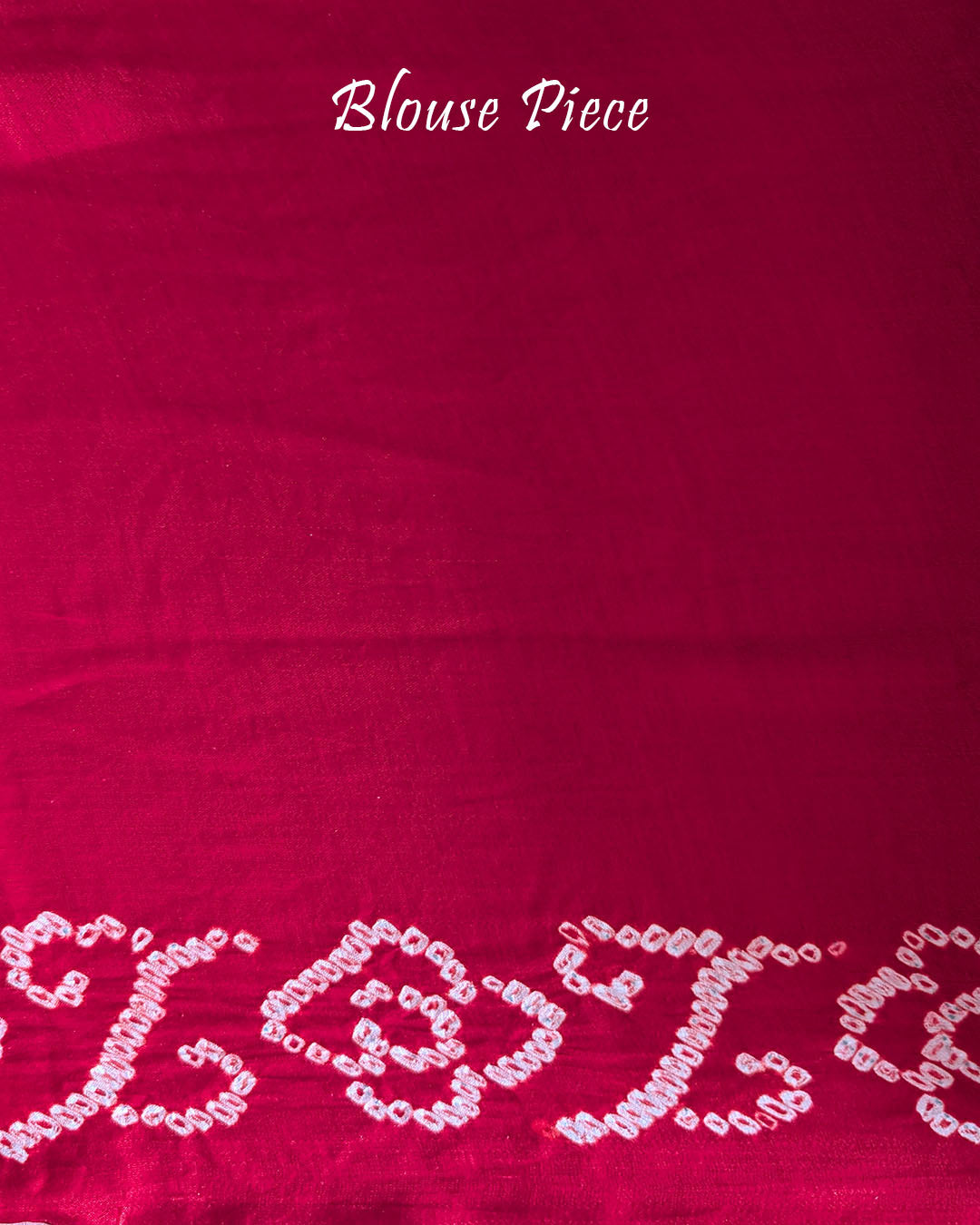Matching blouse piece of the Blush Pink Pure Gajji Silk Bandhani Saree