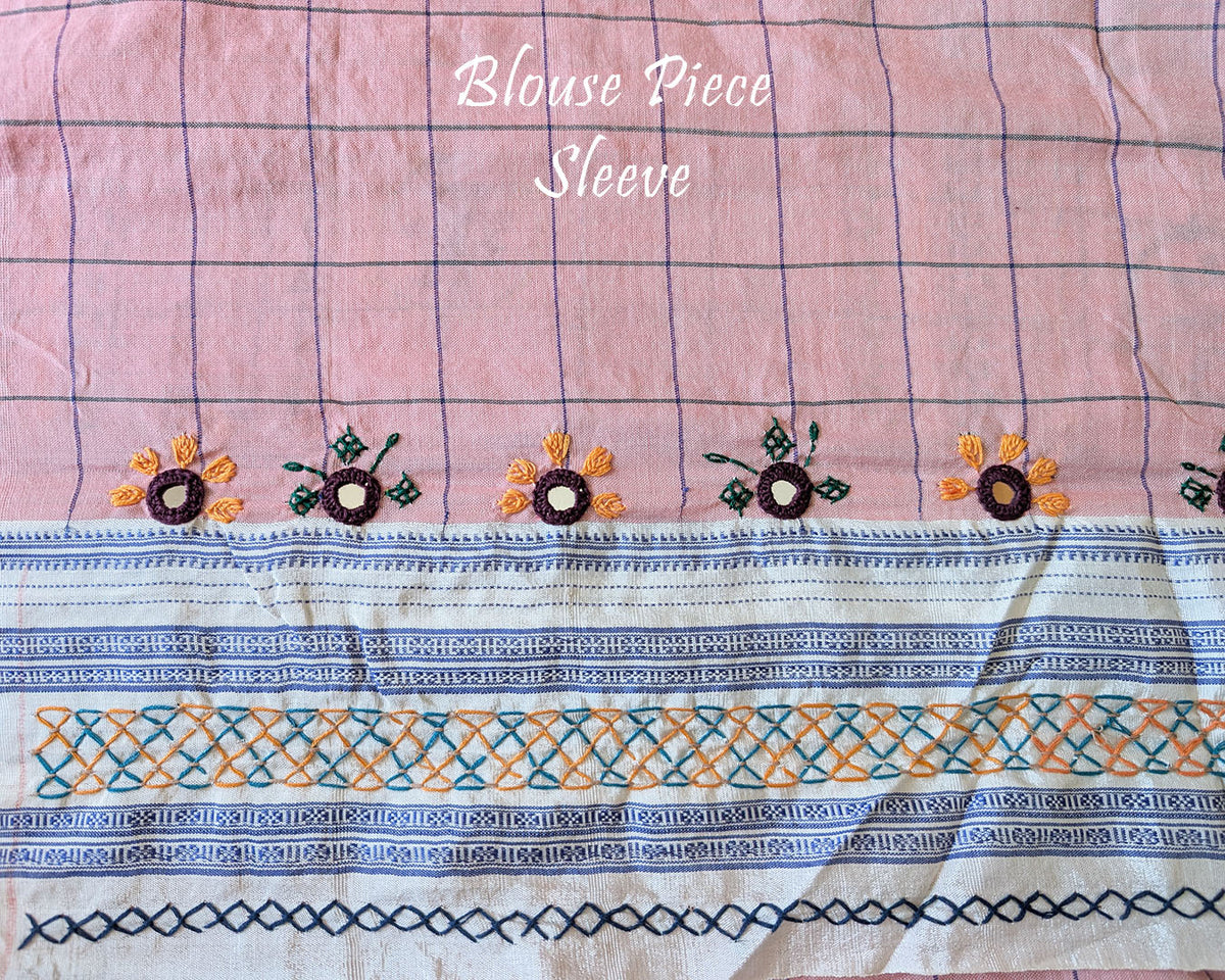 Matching blouse sleeve featuring intricate handcrafted Lambani hand embroidery that highlights the fine artisan craftsmanship and coordinated design of the saree ensemble