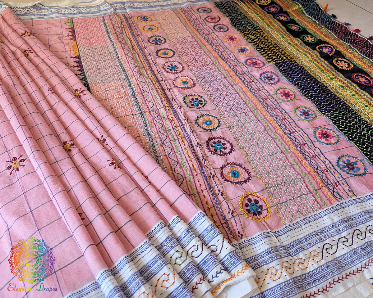 Close-up of delicate Lambani embroidered bootas on the Blush Pink checked Ilkal cotton saree