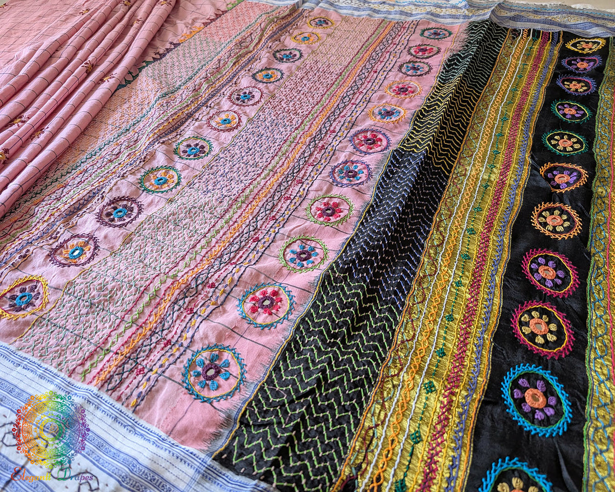 Blush Pink checked Ilkal cotton saree showcasing approximately 1-meter heavily embroidered Lambani palla