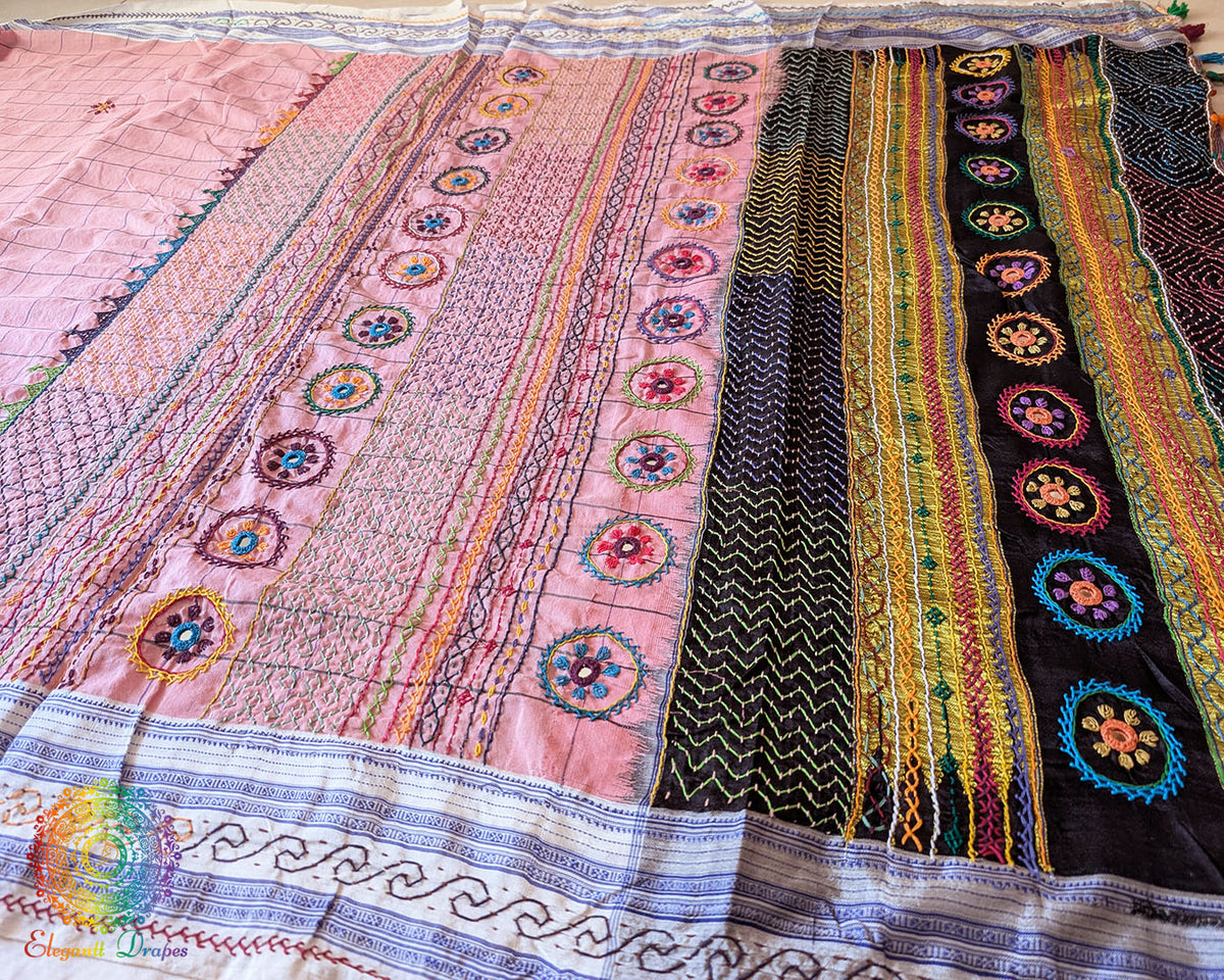 Pastel Blush Pink checked Ilkal cotton saree highlighting delicate Lambani embroidered bootas