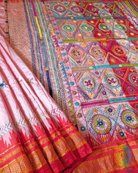 Lambani hand embroidery detail on blush pink Ilkal silk saree border