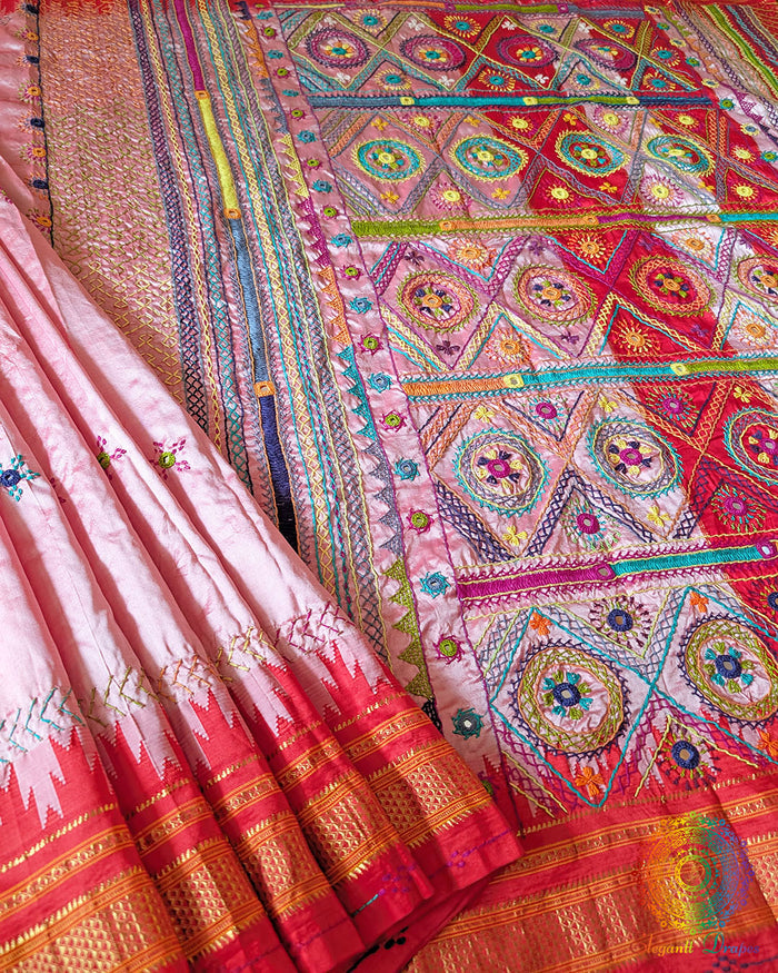 Lambani hand embroidery detail on blush pink Ilkal silk saree border