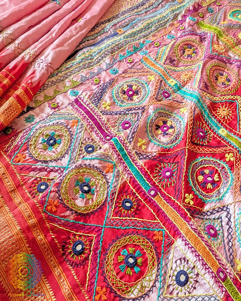 Palla close up showcasing intricate Lambani hand embroidery on Ilkal silk saree