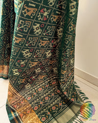 Bottle green pure mulberry silk Rajkot Patola saree palla