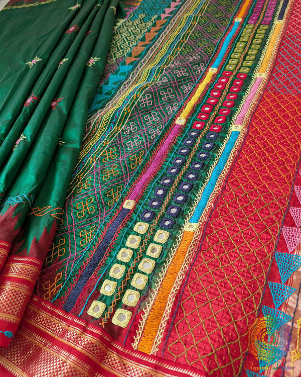 Deep Green Pure Ilkal Silk Saree displayed in a full-length view, showcasing the traditional Ilkal silk weave and striking combination of green and red.