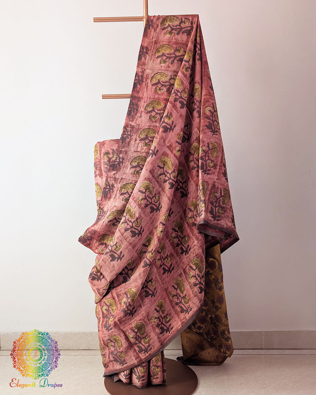 Brick Red Nashpal Pomegranate Ajrakh Modal Tussar Saree with the palla fully opened, displaying its rich brick red colour and traditional striped Ajrakh design.