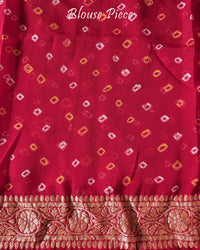 Matching blouse piece with coordinated Banarasi weaving and Bandhani design