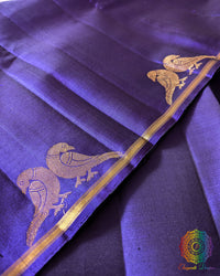 Close-up of pair of peacock motifs on the borderless Brinjal Kanjivaram Silk Saree