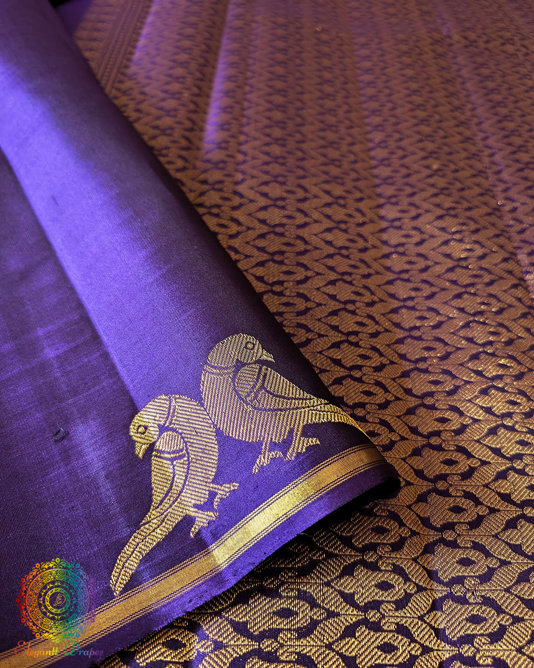 Close-up of 2-Gram Zari pair of peacock motifs on Brinjal Pure Kanjivaram Silk Saree