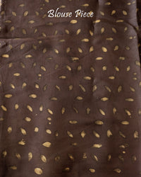 Blouse piece of the Brown Nashpal Pomegranate Ajrakh Modal Tussar Saree, showcasing its coordinating colour and traditional print details.