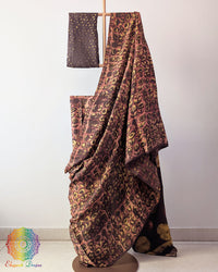 Brown Nashpal Pomegranate Ajrakh Modal Tussar Saree with the palla fully opened, showcasing its traditional pomegranate-inspired Ajrakh patterns and earthy brown tones.