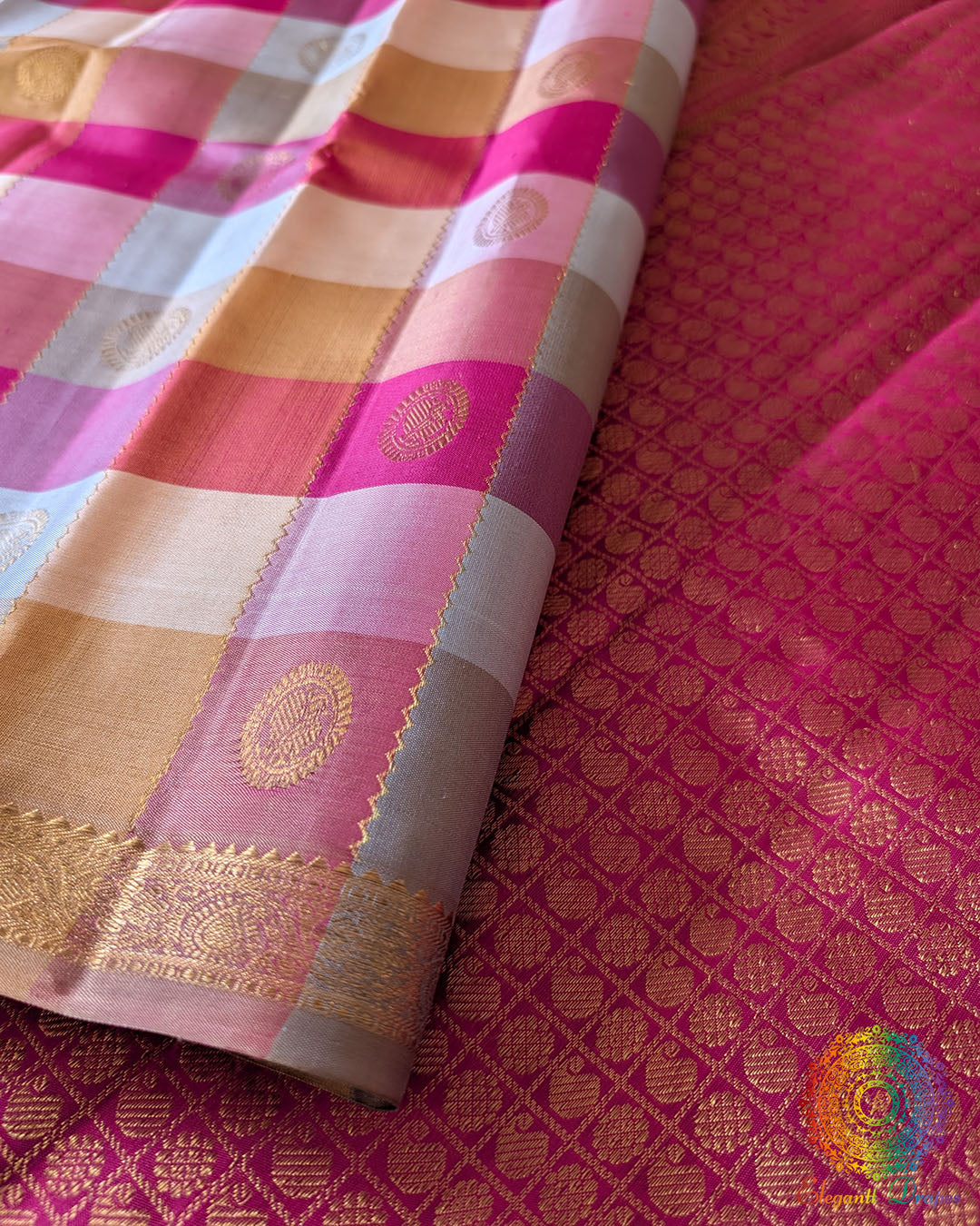Close-up of the checked silk weave and authentic 1-Gram Gold Zari buttas on the Pink Taupe Pure Kanjivaram Silk Saree
