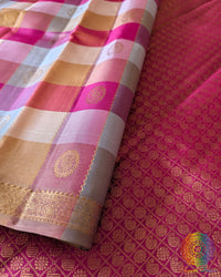 Close-up of the checked silk weave and authentic 1-Gram Gold Zari buttas on the Pink Taupe Pure Kanjivaram Silk Saree
