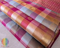Pleats of the Pink Taupe Checked Pure Kanjivaram Silk Saree highlighting the elegant checked pattern and graceful silk drape